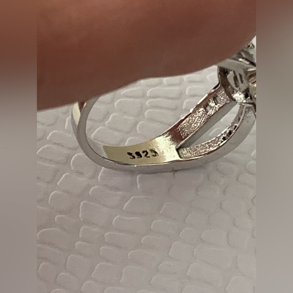 Enhanced Blue Sapphire And Cubic Zirconia Accent Swirled Heart Ring in Sterling - Picture 10 of 13